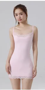 Close-up detail of the delicate pink lace trim on this slim fit camisole bodycon dress