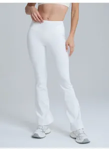 High-waisted white flared yoga pants for women with a flattering peach butt-lifting fit.