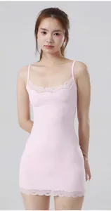 Elegant pink lace trim camisole dress with a slim bodycon fit for a stylish summer look