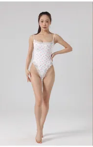 White heart-print bodysuit with lace trim and slim fit adjustable straps front view.