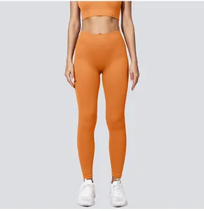 Hoch taillierte orangefarbene nahtlose Yoga-Leggings mit Rippstruktur für das Fitnessstudio