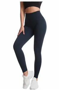 Naadloze marineblauwe yoga leggings met hoge taille en buikcontrole voor sport.
