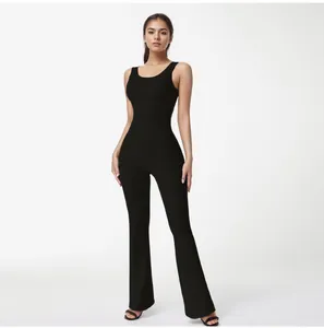 Detail view of the black ribbed U-neck sleeveless flared pants yoga jumpsuit