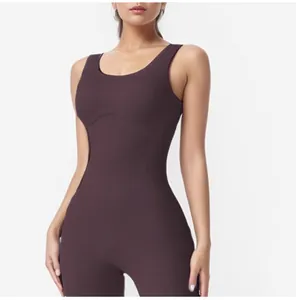Close-up detail of dark brown ribbed U-neck yoga bodysuit featuring wide shoulder straps