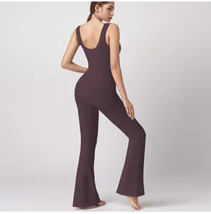 Back view of ribbed U-neck yoga jumpsuit with flared pants and open back design