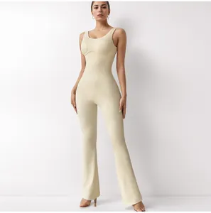Detailed front view of a cream ribbed U-neck sleeveless flared yoga bodysuit for women