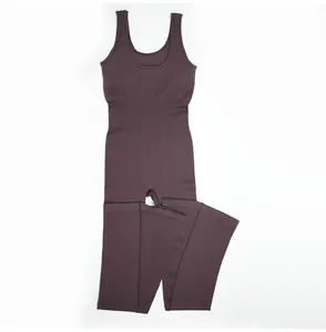 Detailed macro shot of the premium ribbed texture on a plum U-neck flared leg yoga jumpsuit