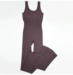 Detailed view of the dark brown ribbed fabric on this U-neck yoga jumpsuit with flare legs