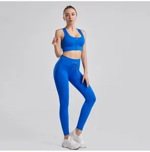 Full body shot showing the fit of the royal blue ribbed workout set on a fitness model.