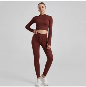 Full body view of a ribbed yoga suit set with a quarter-zip crop top and leggings