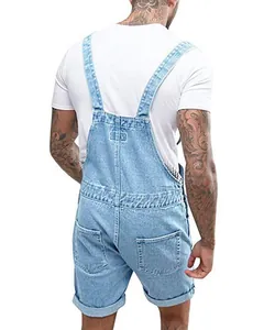 Back view of men's vintage light blue denim overall shorts with pockets and folded hem
