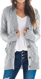 Detail of women's grey cable-knit long cardigan sweater with buttons and pockets