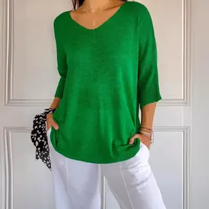 Casual women's bright green V-neck knit sweater with loose fit and half sleeves