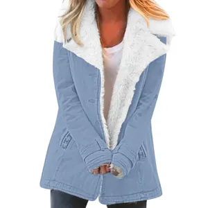 Women's stylish blue mid-length winter jacket featuring a plush white faux fur collar