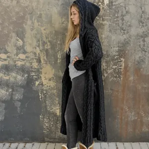 Side view of a premium long black hooded cable-knit cardigan sweater for women.