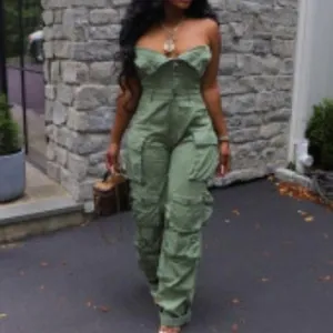 Sexy olive green strapless high waist cargo jumpsuit with multiple pockets detail.