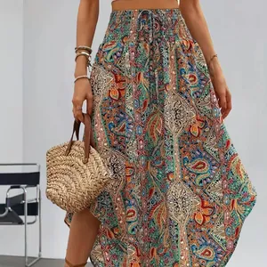 Bohemian ethnic print A-line maxi skirt with smocked high waist and drawstring detail.
