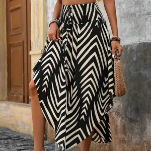 Bohemian A-line maxi skirt featuring a bold black and white geometric chevron print
