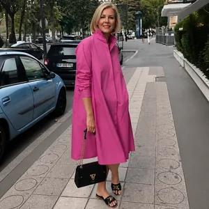 Elegant loose cotton linen long-sleeved shirt dress in vibrant magenta pink color