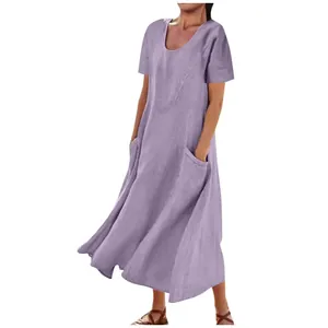 Detailed view of loose purple cotton linen dress with practical side pockets