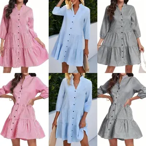 Vue détaillée de robes chemises à carreaux à col montant pour le printemps en plusieurs couleurs