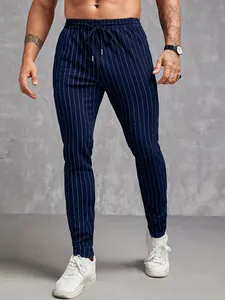 Détail du jogging slim bleu marine à rayures pour hommes avec cordon de serrage chic
