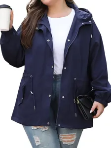 Detail of a navy blue women's waterproof hooded outdoor jacket with adjustable drawstring waist.