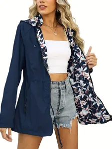 Women's slim fit waterproof windbreaker featuring stylish floral lining and drawstring waist