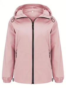 Front view of a lightweight pink hooded windbreaker jacket for women with zipper