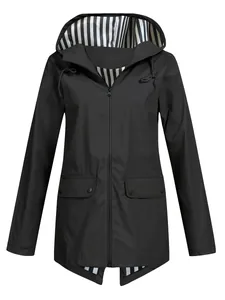 Front view of women's black hooded raincoat featuring stylish striped lining detail