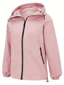 Close-up detail of a women's lightweight pink hooded windbreaker with a black front zipper