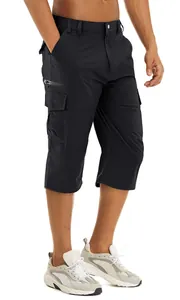 Detail view of men's water-repellent cargo shorts in black with multiple pockets