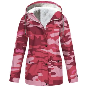 Close-up of a red camouflage outdoor jacket featuring a warm white sherpa fleece lining