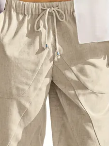Close-up detail of men's cotton linen casual shorts showing texture and drawstring