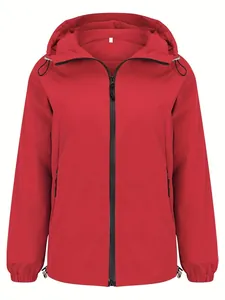 Close-up of red women's lightweight hooded windbreaker jacket with zipper details