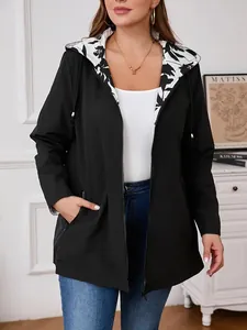 Women's lightweight hooded windbreaker jacket with floral print lining and zip pockets