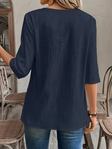 Back view of a navy blue textured 3/4 sleeve blouse for a casual look