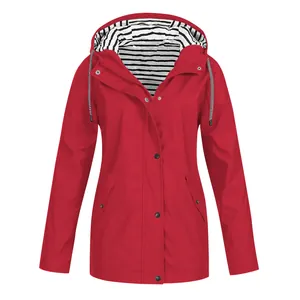 Detail view showing a red waterproof outdoor hooded jacket with striped lining details