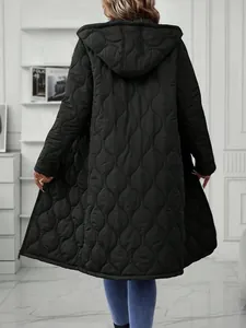 Back view of a long black quilted hooded jacket for women showing unique texture