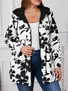 Front view of women's lightweight floral windbreaker with hood and full-length zipper.