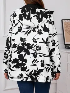 Detailed back view of women's lightweight hooded windbreaker featuring bold black floral print