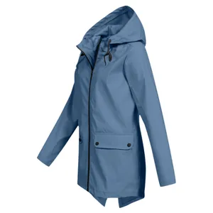 Side view of a blue hooded lightweight windbreaker for women with large pockets.