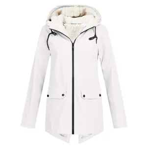 Detailed view of women's white fleece-lined hooded windbreaker with black zipper accents