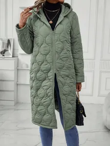 Close-up detail of women's long hooded quilted sage green coat with warm padding
