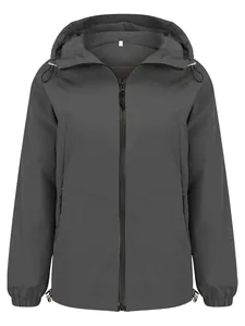 Detailed view of a dark gray lightweight windproof hooded outdoor jacket for women.
