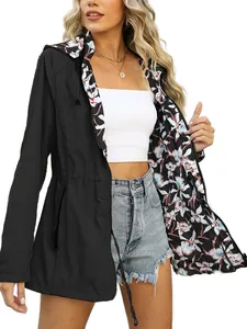 Detail view of women's slim-fit waterproof windbreaker with floral lining