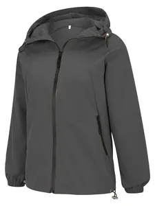 Close-up detail of women's lightweight grey hooded windbreaker with durable zip-up closure.