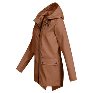 Side view detail of a rust-brown hooded lightweight outdoor windbreaker jacket for women