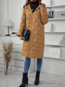 Stylish long hooded quilted puffer jacket for women in mustard yellow with zip-up front.