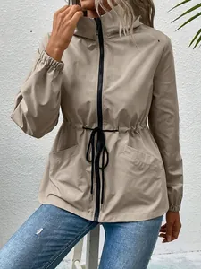 Women's waterproof outdoor hiking windbreaker with drawstring waist in beige